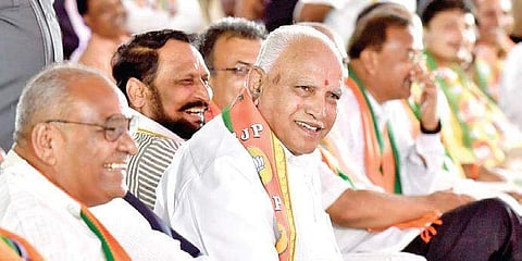 Chief Minister B S Yediyurappa, Deputy Chief Minister Laxman Savadi and other BJP leaders campaigning in Athani ahead of the bypolls, on Monday