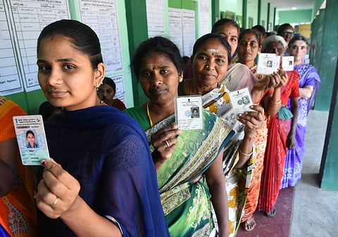 Voters standing in queue at Dhevarayapuram panchayat in Coimbatore. (Photo | A Raja Chidambaram, EPS)