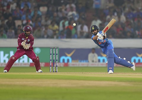 India's captain Virat Kohli, right, plays a shot during the first Twenty20 international cricket match between India and West Indies in Hyderabad, India, Friday, Dec. 6, 2019. (Photo | AP)