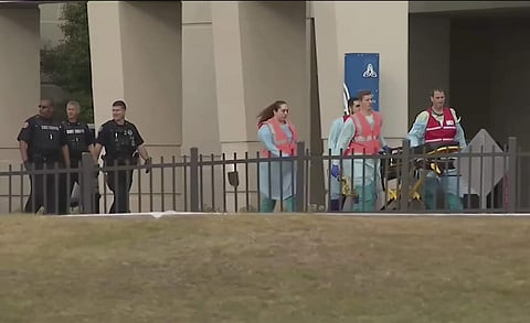 This photo taken from video provided by WEAR-TV shows emergency responders near the Naval Air Base Station in Pensacola, Fla., Friday, Dec. 6, 2019. (Photo | AP)
