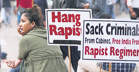A woman at a protest demanding strong punishment for rapists at Rajiv Chowk in New Delhi on Friday (Photo | Arun Kumar, EPS)