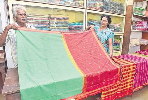 Staffers of Karkala-based Kadike Trust display a Udupi Sari