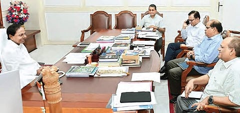Chief Minister K Chandrasekhar Rao interacts with officials during a review of the financial situation of the state, in Hyderabad on Saturday | Express