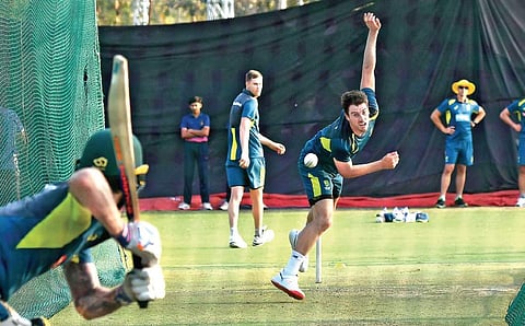 Australia speedster Pat Cummins bowls during practice at Uppal Stadium in Hyderabad on Thursday | Express