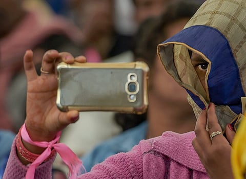 New Delhi A woman takes photo as she participates in 'Dignity March' comprising rape and sexual violence survivors who are raising awareness about sexual violence reaches Ramlila Maidan in New Delhi Friday Feb 22 2019. (Photo | PTI)
