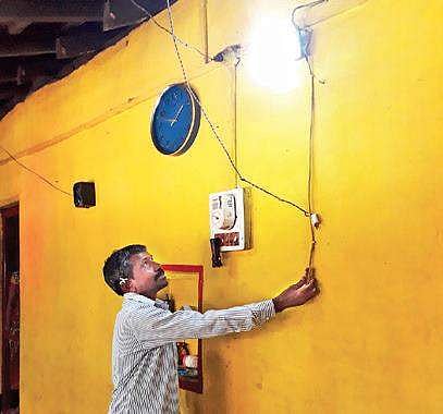 Solar light and battery at a house in Satageri