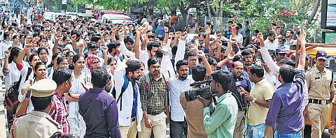 Junior doctors at Gandhi Hospital protesting physical assault of a junior doctor by patients’ kin on Wednesday | Sathya Keerthi