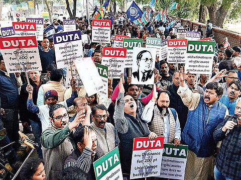 Activist groups at a protest against an interim order of the Supreme Court, which would have resulted in the eviction of 11.8 lakh tribals | Express