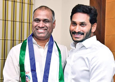 Industrialist Potluri Vara Prasad with YSRC chief YS Jagan Mohan Reddy at Lotus Pond in Hyderabad on Wednesday | Express