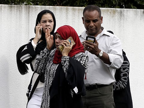 People wait outside a mosque in central Christchurch, New Zealand, Friday, March 15, 2019. Many people were killed in a mass shooting at a mosque, a witness said. (Photo | AP)