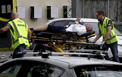 Ambulance staff take a man from outside a mosque in central Christchurch, New Zealand, Friday, March 15, 2019. (Photo | AP)