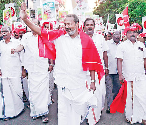 Rajaji Mathew Thomas-CPI candidate for the Thrissur Lok Sabha constituency, Rajaji Mathew Thomas, greeting the public ahead of the LDF convention at Irinjalakuda. | Express