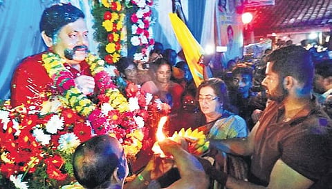Actress Sumalatha and son Abhishek inaugurate the bust of Ambareesh in Dodda Arasinakere, Mandya, on Friday | EXPRESS