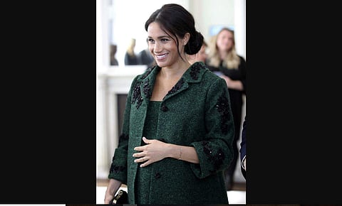 Britain's Meghan, Duchess of Sussex arrive for the Commonwealth Day Youth Event with Prince Harry, at Canada House in London. (Photo | AP)