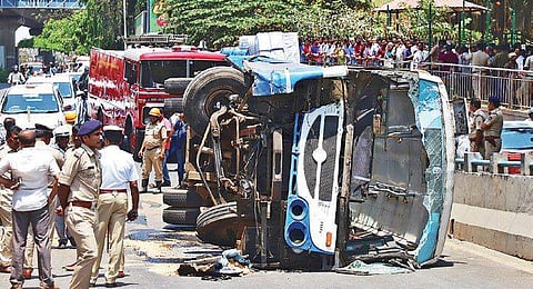 The toppled bus occupied one ramp that leads up to the grade separator.
