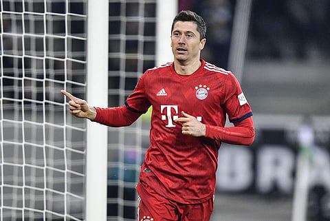 Bayern's 11th win in 12 league games means only goal difference separates them and Dortmund | AP