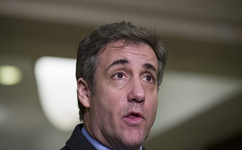 Michael Cohen, President Donald Trump's former lawyer, speaks as he departs after testifying before a closed-door session of the House Intelligence Committee. (AP photo)