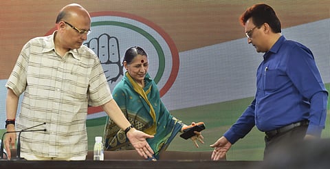 Congress senior leader Abhishek Manu Singhvi welcomes former BJP leader Krishna Tirath after she rejoined Congress Party at AICC headquarters in New Delhi Friday April 12 2019. | PTI