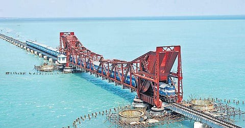 A train passing through the Pamban railway bridge at Rameswaram