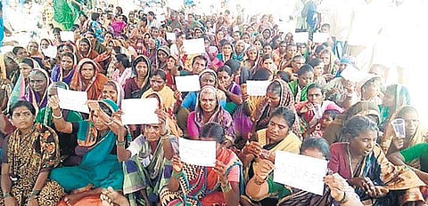 Women voters protest outside a polling booth in Raichur on Tuesday | Express