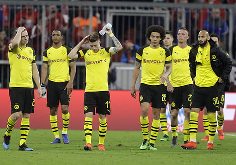Bayern are only a point ahead of Dortmund with six games to go. | AP