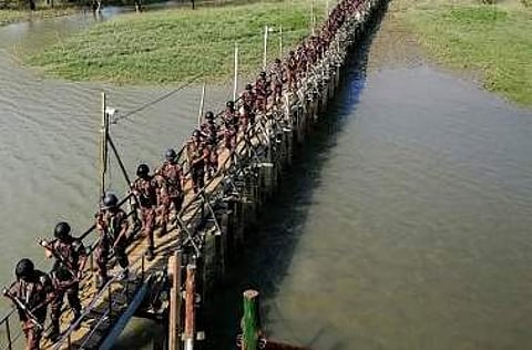 Border Guard Bangladesh personnel disembark as they have been deployed on Saint Martin's island, a small island in the Bay of Bengal (Photo | AFP)