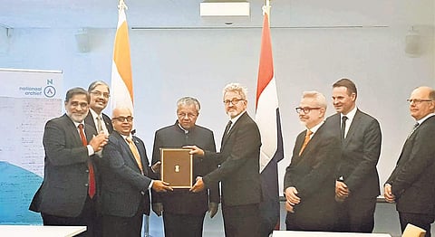 Chief Secretary Tom Jose handing over a Letter of Intent for Collaboration between the National Archives and the state government in preservation and digitisation of Dutch records in Kerala, to ML Engelhard, Director, National Archives of the Netherlands