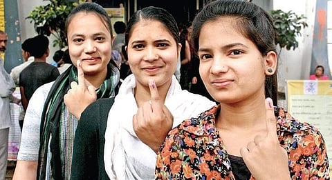 First time voters pose after casting their vote in Bhopal on Sunday. | PTI