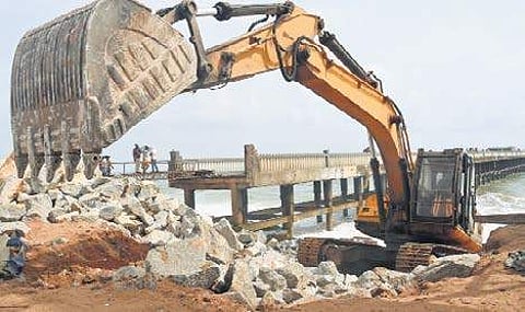 The current spell of rough sea has lent a body blow to the structure as officials scramble to reinforce the pier by lining boulders along the coast (Photo: B P Deepu/EPS)
