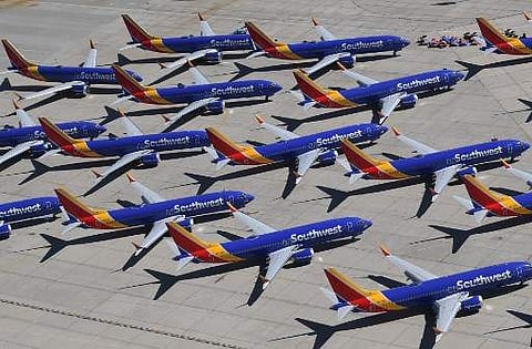 In this file photo taken on March 28, 2019 Southwest Airlines Boeing 737 MAX aircraft are parked on the tarmac after being grounded, at the Southern California Logistics Airport in Victorville, California.