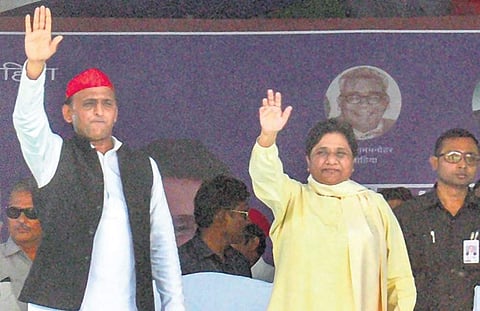 BSP supremo Mayawati and SP president Akhilesh Yadav wave at the crowd during an election campaign rally in Barabanki, Uttar Pradesh, on Wednesday | Pti