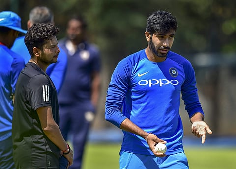 Jasprit Bumrah(R) and Kuldeep Yadav. (Photo | PTI)