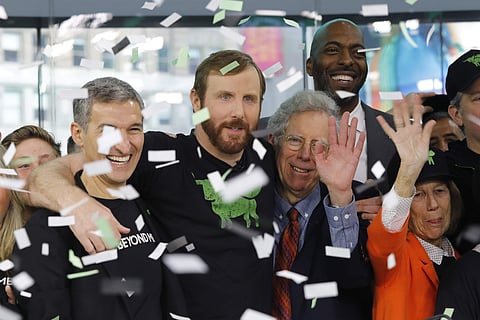 Ethan Brown, center, CEO of Beyond Meat, attends the Opening Bell ceremony to celebrate the company's IPO at Nasdaq. (Photo : AP)