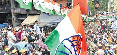 Delhi Chief Minister Arvind Kejriwal addresses a rally in East Delhi even as Congress supporters gather around him | Parveen negi