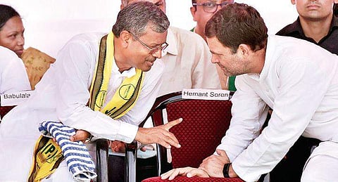 Congress president Rahul Gandhi with Babulal Marandi at a rally in Jharkhand | PTI