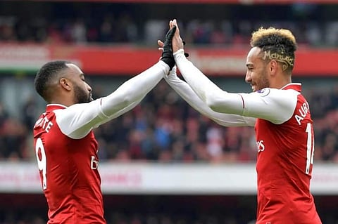 Arsenal forwards Alexandre Lacazette and Pierre-Emerick Aubameyang (File Photo | AFP)