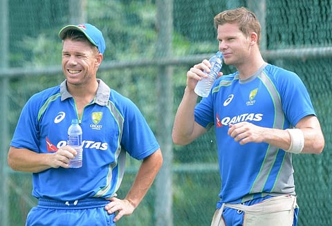 Australian cricketer David Warner (L) and Steve Smith (File | AFP)