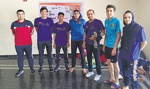 Afghan coach Bashir Taraki (third from right) with the squad