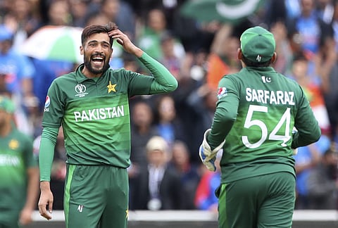 Mohammad Amir(L) with Sarfaraz Ahmed. (Photo | AP)