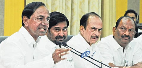 Chief Minister K Chandrasekhar Rao showing the design of the proposed Telangana Secretariat complex at a media conference in Hyderabad. (Photo | Senbagapandiyan, EPS)