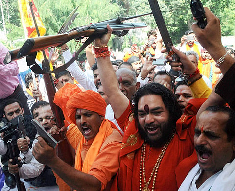 Image of Bajrang Dal activists holding guns used for representational purpose (File Photo | PTI)
