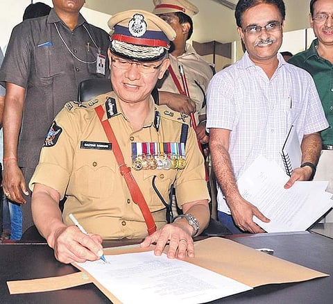 Gautam Sawang taking charge as DGP at the Police Headquarters in Mangalagiri on Saturday I Express