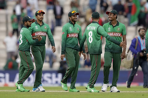 Shakib Al Hasan celebrates with Bangladesh teammates. (Photo | AP)