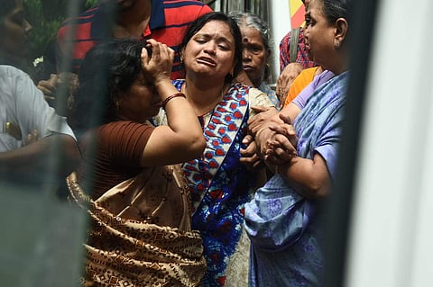 Bereaved family members of News J reporter Prasanna who died of suspected refrigerator blast in Chennai on Thursday. (Photo | Ashwin Prasath, EPS)