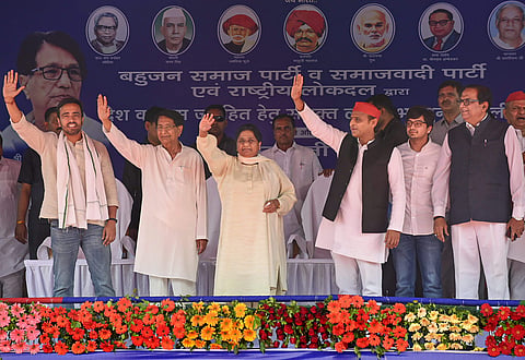 Samajwadi Party President Akhilesh Yadav, BSP supremo Mayawati and RLD chief Ch Ajit Singh along with other leaders wave at the supporters during their joint election campaign rally at Deoband in Saharanpur. (File | PTI)
