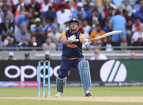 Mahendra Singh Dhoni bats during the Cricket World Cup match between India and England in Birmingham, England. (Photo | AP)
