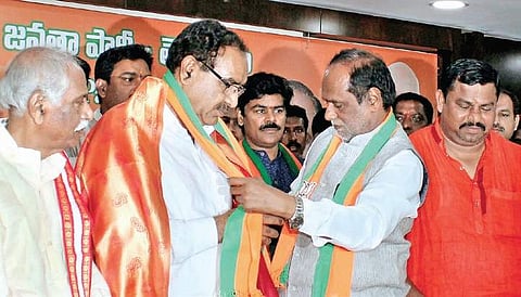 Former legislator Somarapu Satyanarayana joins BJP in the presence of K Laxman, party State president, at the BJP State office in Hyderabad on July 13 (Photo | EPS)