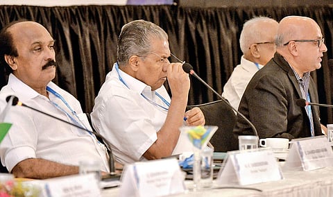 Chief Minister Pinarayi Vijayan, Revenue Minister E Chandreskharan and Chief Secretary Tom Jose at the Rebuild Kerala Conclave | Vincent Pulickal