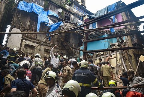 NDRF personnel carry out rescue operation at the incident site after collapse of the four-storey Kesarbai building at Dongri in Mumbai Tuesday July 16 2019. | PTI