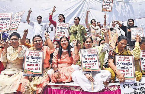 SDMC Mayor Sunita Kangra along with South MCD members and councillors at the dharna seeking release of funds to the civic body on Friday | Parveen Negi